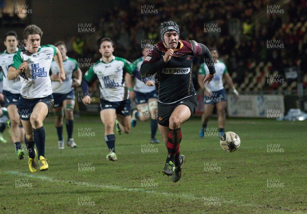 110216 - Newport Gwent Dragons v Connacht, Guinness PRO12 - Adam Hughes of Newport Gwent Dragons dives in to score try