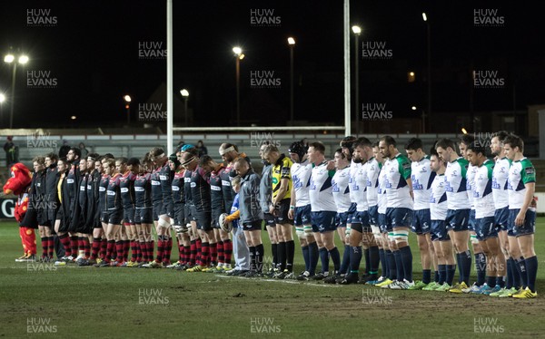 110216 - Newport Gwent Dragons v Connacht, Guinness PRO12 - Players and officials observe a minutes silence at the start of the match in a mark of respect to Lynn Dee, mother of Dragons hooker Elliot Dee, who passed away recently after a short illness