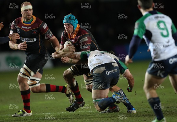 110216 - Newport Gwent Dragons v Connacht, Guinness PRO12 - Ben White of Newport Gwent Dragons charges into Jake Heenan of Connacht