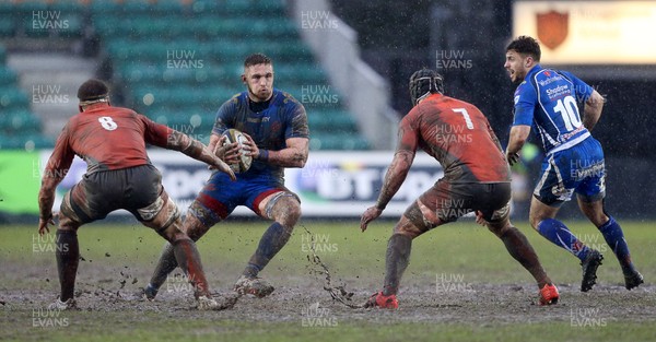 290117 - Newport Gwent Dragons v Newcastle Falcons - Anglo-Welsh Cup - Harri Keddie of Newport Gwent Dragons takes on Mark Wilson and Will Welch of Newcastle