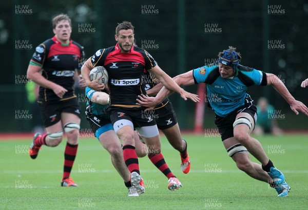 140815 - Newport Gwent Dragons v Nottingham - Pre Season Friendly - Jason Tovey of Newport Gwent Dragons  breaks through the Nottingham defence