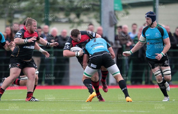 140815 - Newport Gwent Dragons v Nottingham - Pre Season Friendly - Luke Garrett of Newport Gwent Dragons is tackled by Rob Langley of Notthingham