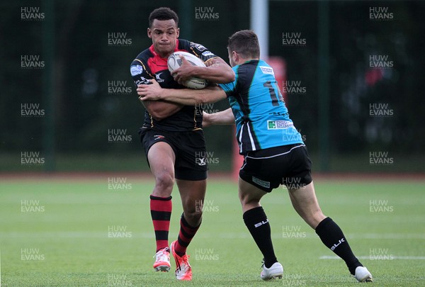 140815 - Newport Gwent Dragons v Nottingham - Pre Season Friendly - Ashton Hewitt of Newport Gwent Dragons is tackled by Sam Coghlan Murray of Notthingham