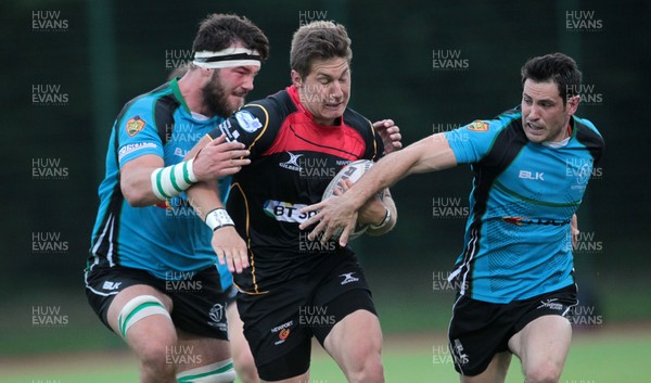 140815 - Newport Gwent Dragons v Nottingham - Pre Season Friendly - Carl Meyer of Newport Gwent Dragons is brought to the ground