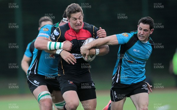 140815 - Newport Gwent Dragons v Nottingham - Pre Season Friendly - Carl Meyer of Newport Gwent Dragons is brought to the ground