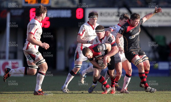 080315 - Newport Gwent Dragons v Ulster - Guinness PRO12 - Dorian Jones of Dragons is tackled by Rob Herring of Ulster