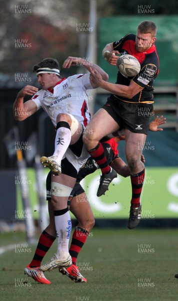 080315 - Newport Gwent Dragons v Ulster - Guinness PRO12 - Jack Dixon of Dragons and Robbie Diack of Ulster collide in the air