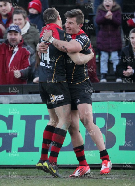 080315 - Newport Gwent Dragons v Ulster - Guinness PRO12 - Carl Meyer celebrates with Tom Prydie of Dragons after scoring a try