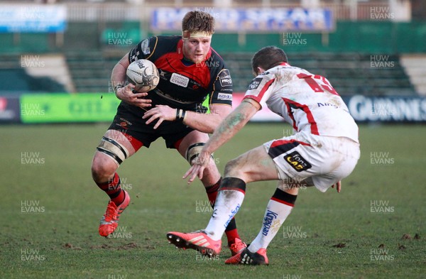 080315 - Newport Gwent Dragons v Ulster - Guinness PRO12 - Andrew Coombs of Dragons is tackled by Darren Cave of Ulster