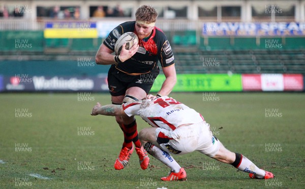 080315 - Newport Gwent Dragons v Ulster - Guinness PRO12 - Andrew Coombs of Dragons is tackled by Darren Cave of Ulster