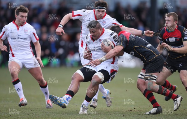 080315 - Newport Gwent Dragons v Ulster, Guinness PRO12 - Ulster's Nick Williams is held by Dragons' James Benjamin