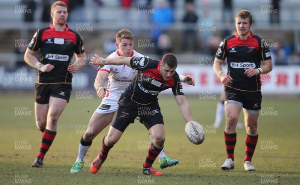 080315 - Newport Gwent Dragons v Ulster, Guinness PRO12 - Dragons' Dorian Jones looks to win the ball as Ulster's Craig Gilroy closes in