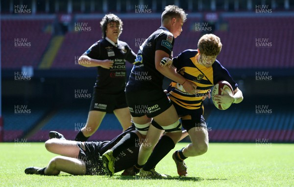 230416 - WRU - Bowl Final - Burry Port v Newport HSOB - Joshua Ford of Newport pushes over the line to score a try