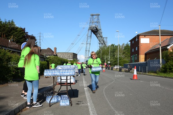 050519 - Newport Wales  Marathon and 10K - Volunteers make preparations at the 24mile and 6K drinks station at Newport Transporter Bridge 