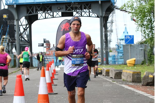 050519 - Newport Wales  Marathon and 10K - Runner for Latch in The Newport Marathon passes the 24 mile marker at The Transporter Bridge 