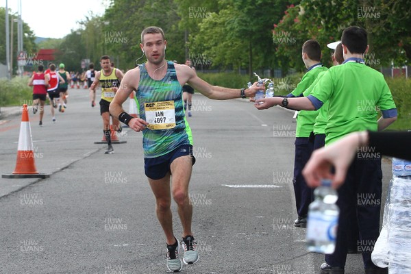 050519 - Newport Wales  Marathon and 10K - 10K runners take on refreshments at Newport Transporter Bridge 