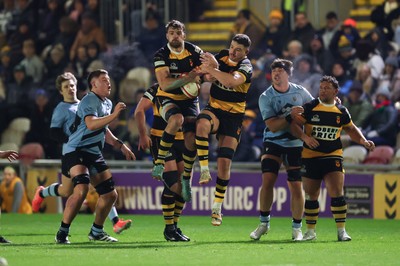 211125 - Newport RFC v Cardiff RFC, Super Rugbi Cymru - Ben Roach of Newport and Ioan Rhys Davies of Newport make sure of possession