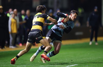 211125 - Newport RFC v Cardiff RFC, Super Rugbi Cymru - Joe Goodchild of Cardiff takes on Iestyn Galton of Newport