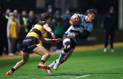 211125 - Newport RFC v Cardiff RFC, Super Rugbi Cymru - Joe Goodchild of Cardiff takes on Iestyn Galton of Newport