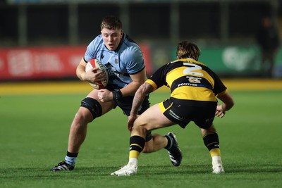 211125 - Newport RFC v Cardiff RFC, Super Rugbi Cymru - Evan Rees of Cardiff takes on Wade Langley of Newport