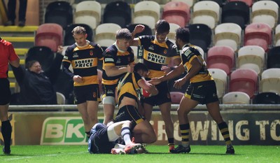 211125 - Newport RFC v Cardiff RFC, Super Rugbi Cymru - Chay Foster-Smith of Newport is congratulated by team mates after he dives over to score try