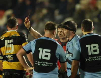 211125 - Newport RFC v Cardiff RFC, Super Rugbi Cymru - Sean Moore of Cardiff, wearing headband, is shown a red card 