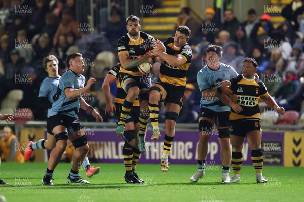 211125 - Newport RFC v Cardiff RFC, Super Rugbi Cymru - Ben Roach of Newport and Ioan Rhys Davies of Newport make sure of possession