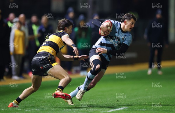 211125 - Newport RFC v Cardiff RFC, Super Rugbi Cymru - Joe Goodchild of Cardiff takes on Iestyn Galton of Newport