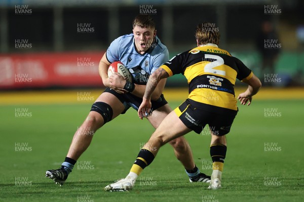 211125 - Newport RFC v Cardiff RFC, Super Rugbi Cymru - Evan Rees of Cardiff takes on Wade Langley of Newport