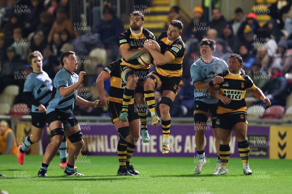 211125 - Newport RFC v Cardiff RFC, Super Rugbi Cymru - Ben Roach of Newport and Ioan Rhys Davies of Newport make sure of possession