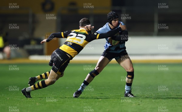 211125 - Newport RFC v Cardiff RFC, Super Rugbi Cymru - Rhys Cummings of Cardiff takes on Morgan Williams of Newport