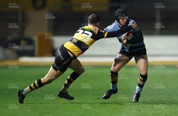 211125 - Newport RFC v Cardiff RFC, Super Rugbi Cymru - Rhys Cummings of Cardiff takes on Morgan Williams of Newport