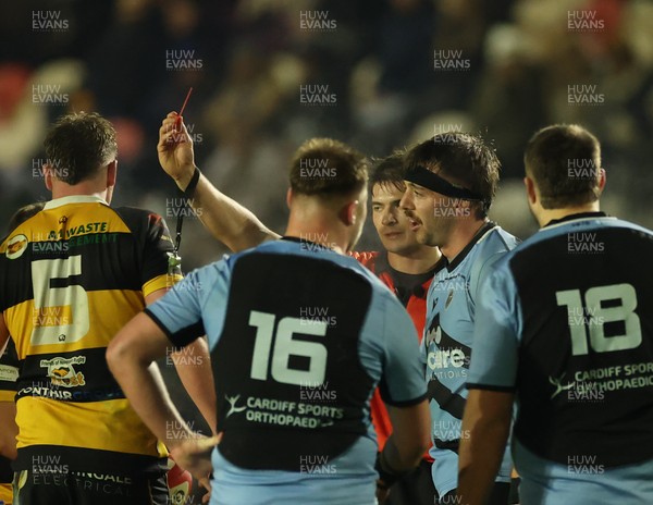 211125 - Newport RFC v Cardiff RFC, Super Rugbi Cymru - Sean Moore of Cardiff, wearing headband, is shown a red card 