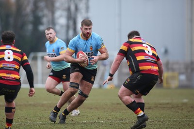 150225 - Newport RFC v Carmarthen Quins - Super Rygbi Cymru (SRC) - Josh Skinner of Newport takes on Connor Allen of Carmarthen