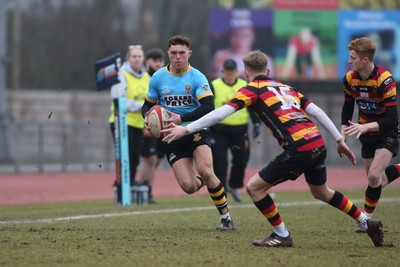 150225 - Newport RFC v Carmarthen Quins - Super Rygbi Cymru (SRC) - Liam Lloyd of Newport takes on Eilir George  of Carmarthen