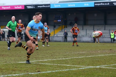 150225 - Newport RFC v Carmarthen Quins - Super Rygbi Cymru (SRC) - Jac Lloyd of Newport chases a chip through to score a try 