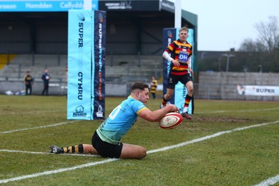 150225 - Newport RFC v Carmarthen Quins - Super Rygbi Cymru (SRC) - Jac Lloyd of Newport chases a chip through to score a try 