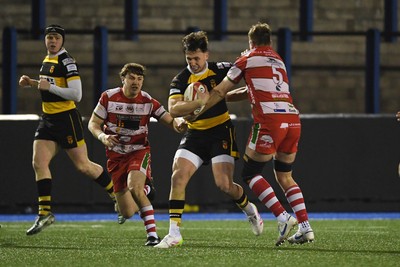 070326 - Newport RFC v Llandovery RFC - SRC Cup Final - Harri Ackerman of Newport is challenged by Joe Powell of Llandovery