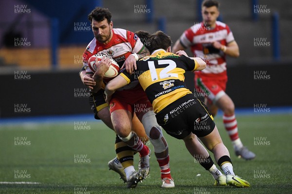 070326 - Newport RFC v Llandovery RFC - SRC Cup Final - Rhodri Jones of Llandovery is challenged by Harrison James of Newport
