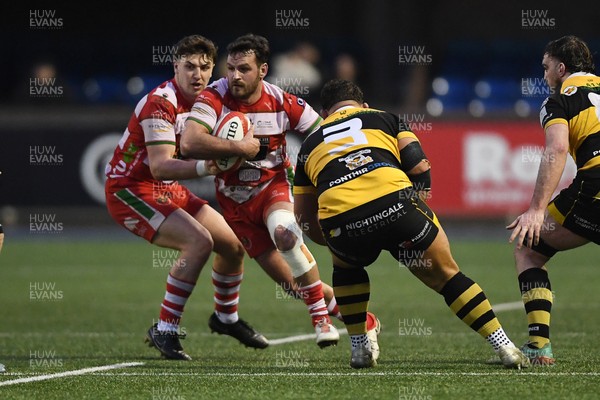 070326 - Newport RFC v Llandovery RFC - SRC Cup Final - Rhodri Jones of Llandovery is challenged by Garin Harris of Newport