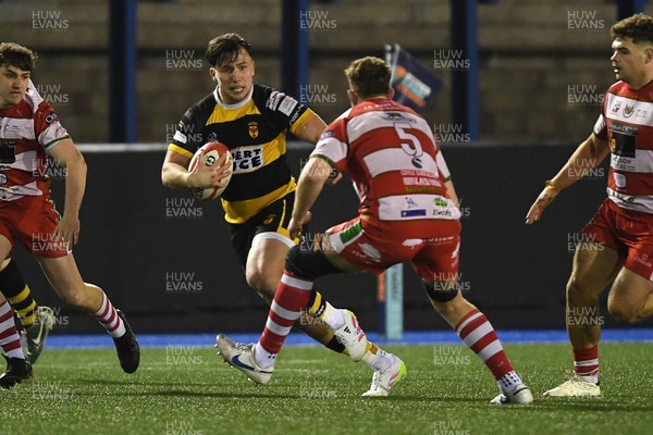 070326 - Newport RFC v Llandovery RFC - SRC Cup Final - Harri Ackerman of Newport is challenged by Joe Powell of Llandovery