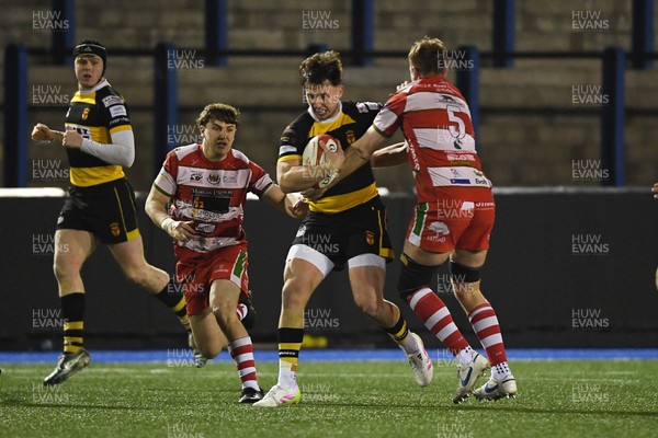 070326 - Newport RFC v Llandovery RFC - SRC Cup Final - Harri Ackerman of Newport is challenged by Joe Powell of Llandovery