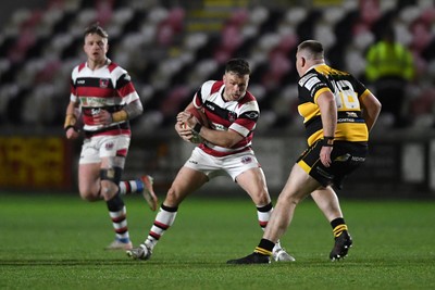 090426 - Newport RFC v Pontypool RFC - Super Rygbi Cymru - Kieran Meek of Pontypool is challenged by Liam Newstead of Newport