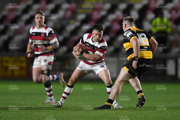 090426 - Newport RFC v Pontypool RFC - Super Rygbi Cymru - Kieran Meek of Pontypool is challenged by Liam Newstead of Newport