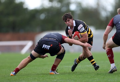 120926 - Newport RFC v Rygbi RGC - Super Rygbi Cymru - SRC - Brogan Leary of Newport is tackled by Harper Chamberlain of RGC 