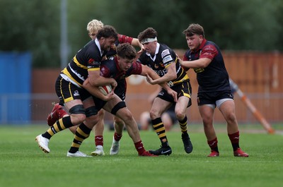 120926 - Newport RFC v Rygbi RGC - Super Rygbi Cymru - SRC - Will Kellett of RGC is tackled by Ben Roach of Newport 