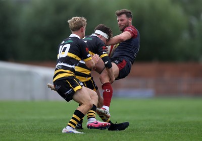120926 - Newport RFC v Rygbi RGC - Super Rygbi Cymru - SRC - Dion Jones of RGC is tackled by Dafydd Buckland of Newport 