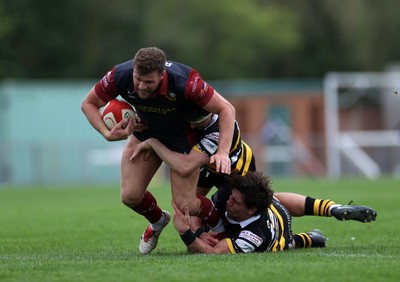 120926 - Newport RFC v Rygbi RGC - Super Rygbi Cymru - SRC - Dion Jones of RGC is tackled by Brogan Leary of Newport 