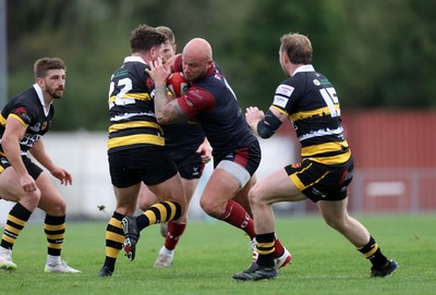 120926 - Newport RFC v Rygbi RGC - Super Rygbi Cymru - SRC - Delwyn Jones of RGC is tackled by Matt O�Brien of Newport 