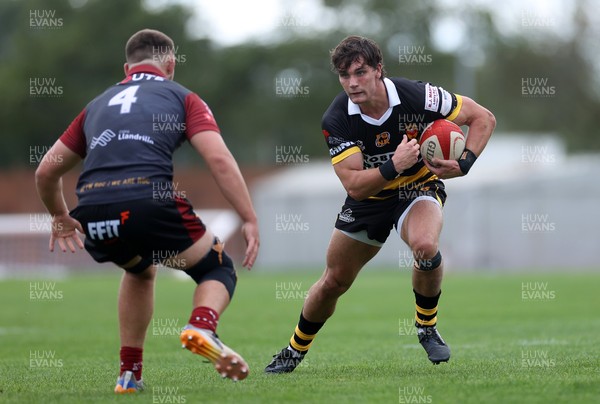 120926 - Newport RFC v Rygbi RGC - Super Rygbi Cymru - SRC - Brogan Leary of Newport is tackled by Harper Chamberlain of RGC 